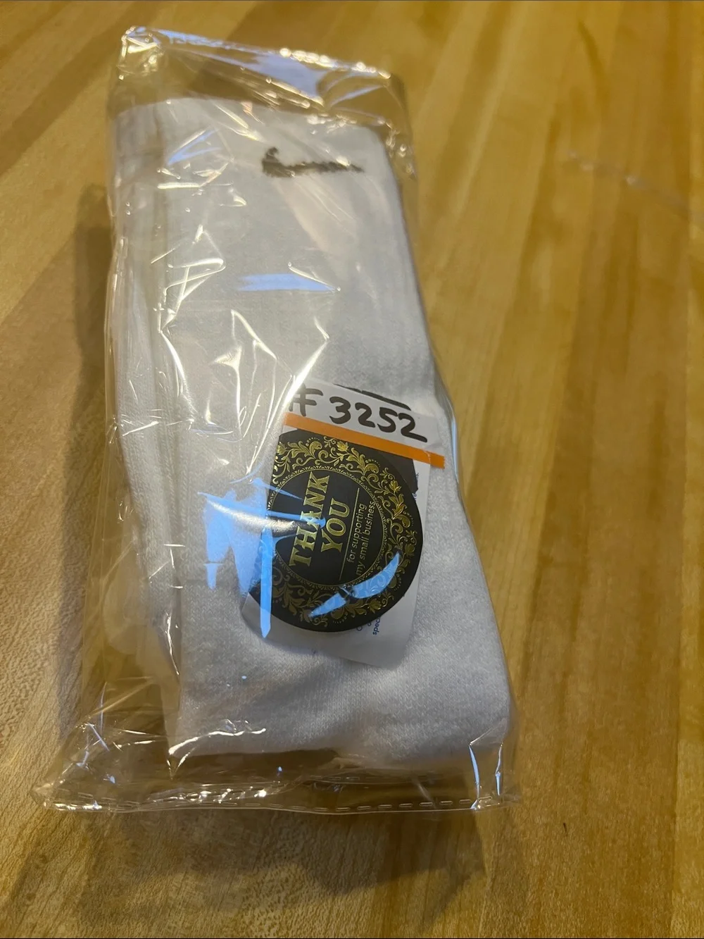 #3252**Nike White Crew Socks with Black Swoosh - Triple Pack